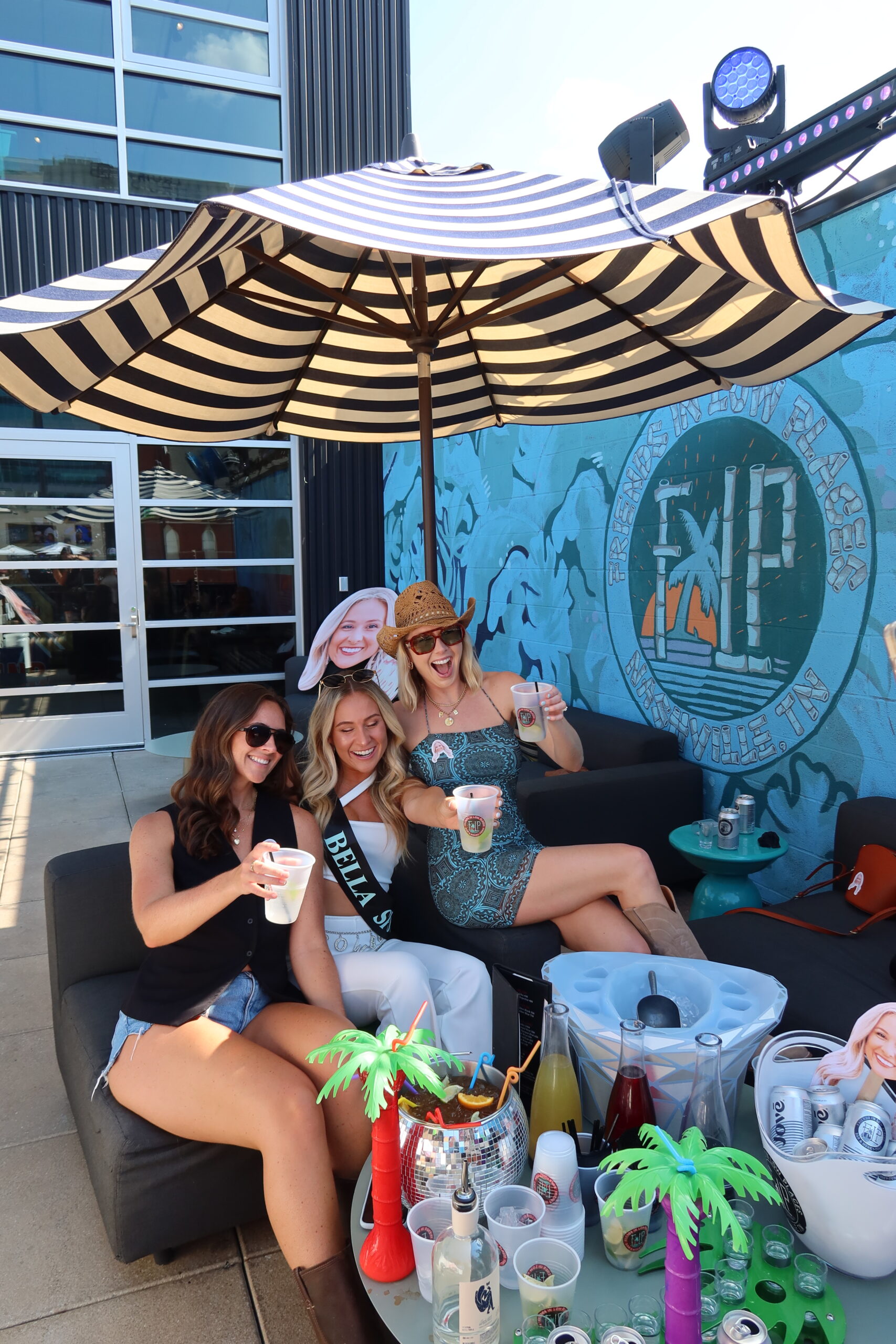 girls on rooftop bar in nashville at Friends in Low Places celebrating a bachelorette