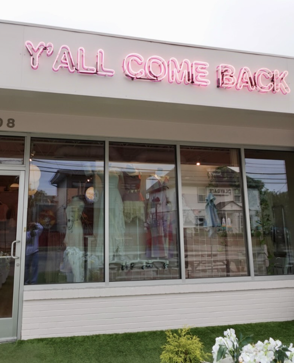 bachelorette girls on broadway wearing cowgirl hats and wearing Molly Green clothes