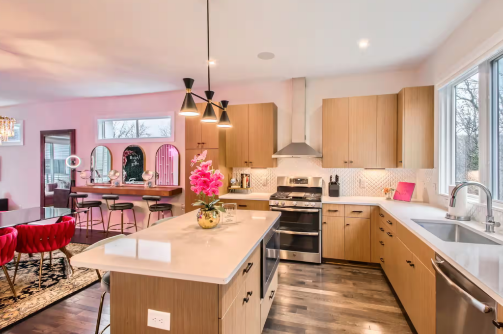 bachelorette airbnb in nashville in all pink, neon signs and disco balls